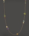 Boldly-hued gems and textured golden beads punctuate a slender 18K yellow gold chain. From the Jaipur Collection.