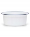 Named for a trendy Copenhagen neighborhood but designed with timeless style, the Christianshavn Blue serving bowl features a double band of navy in pristine white porcelain. From Dansk.