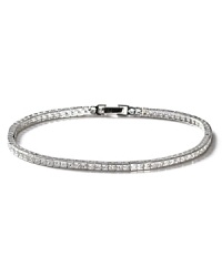This slender princess-cut tennis bracelet sparkles with fine cubic zirconia. Five petite stones adorn the clasp. This slender princess-cut tennis bracelet sparkles with fine cubic zirconia. Five petite stones adorn the clasp.
