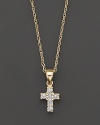 A heavenly diamond cross pendant in 14 Kt. yellow gold, with rope chain.