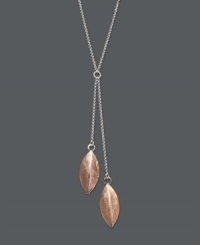 Add a delicate layer for an ultra-chic look. Studio Silver's contemporary pendant features two delicate sterling silver chains that highlight leaf-shaped charms in 18k gold over sterling silver. Approximate length: 16 inches. Approximate chain drops: 2-1/2 inches and 2 inches. Approximate charm drop: 1 inch. Add a delicate layer for an ultra-chic look. Studio Silver's contemporary pendant features two delicate sterling silver chains that highlight leaf-shaped charms in 18k gold over sterling silver. Approximate length: 16 inches. Approximate chain drops: 2-1/2 inches and 2 inches. Approximate charm drop: 1 inch.