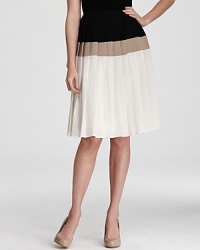 Pairing crisp color blocking with a classic pleated silhouette, this RAOUL skirt infuses your workweek wardrobe with modern femininity. Pairing crisp color blocking with a classic pleated silhouette, this RAOUL skirt infuses your workweek wardrobe with modern femininity.