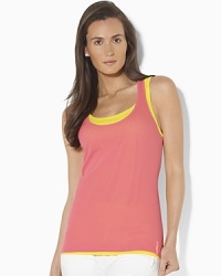 A vibrant layered tank is a stylish essential for fitness and casual attire alike. A vibrant layered tank is a stylish essential for fitness and casual attire alike.