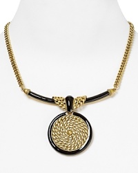 Bolder is better: T Tahari models statement style with this pendant necklace, crafted of gold plated metal and accented by a ropey circle pendant. Bolder is better: T Tahari models statement style with this pendant necklace, crafted of gold plated metal and accented by a ropey circle pendant.