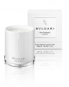 Reassuring, comforting and intimate, the Eau Parfumée au Thé Blanc candle is a luxuriously elegant expression of sensory pleasure to create the perfect ambiance in any room. A floral, woody musk structured around white tea evokes a pleasing sense of calmness. Burn time: 50 hours. Made in Italy. 
