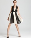 Fashioned in flowing chiffon, this Max & Cleo dress boasts a striking black-and-white color scheme for a graphic punch.