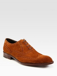 Understated style, in soft, perforated suede finished with a classic leather sole.Suede upperLeather liningPadded insoleLeather soleMade in Italy Understated style, in soft, perforated suede finished with a classic leather sole.Suede upperLeather liningPadded insoleLeather soleMade in Italy