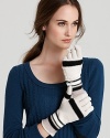 Hands look neat and neutral in these cozy SONIA RYKIEL gloves, covered in cream stripes of varying heights.