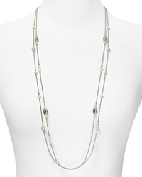 Strands of shimmering glass pearls take on a new state of grace on this two row Lauren Ralph Lauren necklace, accented by elegant crystal stations. Strands of shimmering glass pearls take on a new state of grace on this two row Lauren Ralph Lauren necklace, accented by elegant crystal stations.