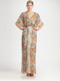 A long, willowy sheath of printed silk chiffon, gathered at the bodice in a shapely blouson silhouette.V necklineGathered shouldersDolman sleevesElastic waistDeep back keyholeAbout 50 from natural waistSilkDry cleanImportedModel shown is 5'11 (180cm) wearing US size Small. A long, willowy sheath of printed silk chiffon, gathered at the bodice in a shapely blouson silhouette.V necklineGathered shouldersDolman sleevesElastic waistDeep back keyholeAbout 50 from natural waistSilkDry cleanImportedModel shown is 5'11 (180cm) wearing US size Small.