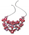 Make a ravishing statement with this necklace from INC International Concepts. Features a bib with colorful red plastic stones for a stunning effect. Crafted in hematite tone mixed metal. Approximate length: 17-1/2 inches + 2-inch extender. Approximate drop: 3 inches.