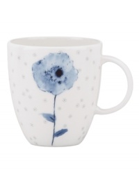 A fresh take on floral patterns, the Watercolors Indigo Blue teacup features painterly blossoms in shades of blue against a lively geometric design. White bone china in an ultra-modern shape provides a sleek foundation for a look that's irresistibly fun.