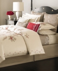 Classically elegant, the Dreamtime Floral comforter from Martha Stewart Collection boasts vintage-inspired floral embroidery at center and along the border. Features a soft, silk-like texture.