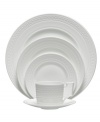 Wedgwood substitutes texture for tone in the timeless Intaglio place settings. White bone china embossed with intricate geometric patterns is undeniably modern but inspired by Georgian-era designs.