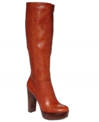 The perfect fashion alibi. Nine West's Escapegoat tall boots feature a smooth almond toe and a chunky, stacked platform and heel. The perfect fashion alibi. Nine West's Escapegoat tall boots feature a smooth almond toe and a chunky, stacked platform and heel.