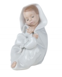 A precious newborn is wrapped and quietly content in this darling porcelain figurine from Lladró. A perfect gift and lasting memento for the mother-to-be.