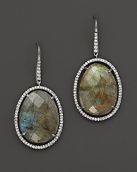 Diamonds circle a faceted doublet of rutilated quartz over smoky labradorite, set in blackened sterling silver. By Di Massima.