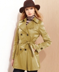 A petite version of the timeless silhouette, DKNY's feminine take on the classic trench coat is just right for blustery days and transitional weather. A petite version of the timeless silhouette, DKNY's feminine take on the classic trench coat is just right for blustery days and transitional weather.