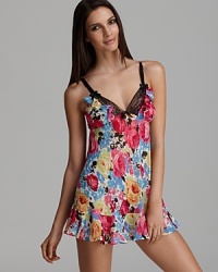 This cute babydoll and thong from Betsey Johnson has it all: an allover floral print design with lace trim and bow detailing at the front and along straps. This cute babydoll and thong from Betsey Johnson has it all: an allover floral print design with lace trim and bow detailing at the front and along straps.