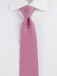 An artistic, colorful pattern is handsomely woven in fine Italian silk.SilkDry cleanMade in Italy