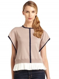 THE LOOKColorblock designPleated detail at hemDraped short sleevesTHE FITAbout 23 from shoulder to hemTHE MATERIALBody: cottonSecond fabric silkCARE & ORIGINDry cleanMade in USAModel shown is 5'10 (177cm) wearing US size Small. THE LOOKColorblock designPleated detail at hemDraped short sleevesTHE FITAbout 23 from shoulder to hemTHE MATERIALBody: cottonSecond fabric silkCARE & ORIGINDry cleanMade in USAModel shown is 5'10 (177cm) wearing US size Small.