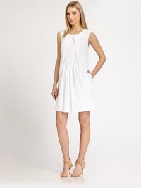 EXCLUSIVELY AT SAKS. Crisp cotton, tailored with an inverted front pleat and delicate pintucks.Jewel necklineInverted front pleatPintucked bodiceSide slash pocketsCotton liningAbout 36¾ from shoulder to hemCottonDry cleanImportedModel shown is 5'10½ (179cm) wearing US size 4. EXCLUSIVELY AT SAKS. Crisp cotton, tailored with an inverted front pleat and delicate pintucks.Jewel necklineInverted front pleatPintucked bodiceSide slash pocketsCotton liningAbout 36¾ from shoulder to hemCottonDry cleanImportedModel shown is 5'10½ (179cm) wearing US size 4.
