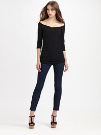 Fitted, shoulder-baring essential has side ruching, three-quarter sleeves and a length that hits below the hips. Off-the-shoulder necklineThree-quarter sleevesSide ruchingLonger length hits below the hips93% cotton/7% polyurethaneDry cleanMade in USA of imported fabricModel shown is 5'10 (177cm) wearing US size Small. Fitted, shoulder-baring essential has side ruching, three-quarter sleeves and a length that hits below the hips. Off-the-shoulder necklineThree-quarter sleevesSide ruchingLonger length hits below the hips93% cotton/7% polyurethaneDry cleanMade in USA of imported fabricModel shown is 5'10 (177cm) wearing US size Small.