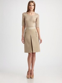 A tiered front panel lends architectural appeal to this soft jersey style.CrewneckShort sleevesTiered front panelCotton/elastaneDry cleanImported of Swiss fabricModel shown is 5'10 (177cm) wearing US size 4. A tiered front panel lends architectural appeal to this soft jersey style.CrewneckShort sleevesTiered front panelCotton/elastaneDry cleanImported of Swiss fabricModel shown is 5'10 (177cm) wearing US size 4.