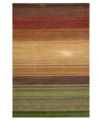 Contemporary scrollwork, detailed Damask and a patchwork of warm, earthy colors form an elegantly constructed look from Nourison. Hand tufted of long polyester fibers for added strength and softness, it creates an ideal accent for any modern room. Contemporary scrollwork, detailed Damask and a patchwork of warm, earthy colors form an elegantly constructed look from Nourison. Hand tufted of long polyester fibers for added strength and softness, it creates an ideal accent for any modern room.