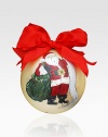 This cheerful glass ornament is decorated with a jolly Santa, list in hand.Arrives in green velvet gift box 2¾ diam. Imported 