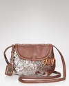 Undeniably day-to-night right, a smattering of sparkles dress up this UGG® Australia crossbody bag.
