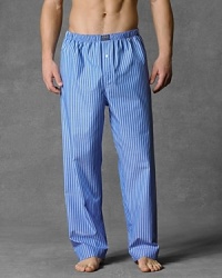 Woven cotton pajama pants with button fly and drawstring and elastic waist. Woven patch on front waistband. Blue, navy and white stripe.