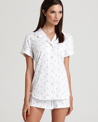 Short and sweet, Lauren Ralph Lauren's two-piece pajama set is quaint in a soft floral print. Short and sweet, Lauren Ralph Lauren's two-piece pajama set is quaint in a soft floral print.