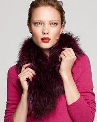 Richly appointed in plush fur, this Adrienne Landau scarf makes a luxurious impact day or night.