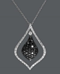 Highlight your neckline with a little shine. EFFY Collection's stunning teardrop-shaped pendant features a center covered in round-cut black diamonds (1/2 ct. t.w.) with a cut-out overlay in white diamonds (1/5 ct. t.w.). Set in 14k white gold. Approximate length: 18 inches. Approximate drop: 3/8 inch. Highlight your neckline with a little shine. EFFY Collection's stunning teardrop-shaped pendant features a center covered in round-cut black diamonds (1/2 ct. t.w.) with a cut-out overlay in white diamonds (1/5 ct. t.w.). Set in 14k white gold. Approximate length: 18 inches. Approximate drop: 3/8 inch.