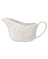 Embossed with a leaf and basketweave motif in white porcelain, Martha Stewart Collection gravy boats cater every meal with elegant charm.