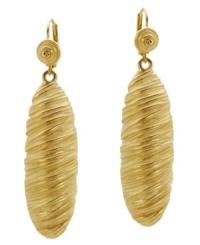 All that glitters in gold! T Tahari's stunning drop earrings from the Essentials Collection feature a unique wrapped texture in gold tone mixed metal. Base metal is nickel-free for sensitive skin. Approximate drop: 2-1/2 inches. All that glitters in gold! T Tahari's stunning drop earrings from the Essentials Collection feature a unique wrapped texture in gold tone mixed metal. Base metal is nickel-free for sensitive skin. Approximate drop: 2-1/2 inches.