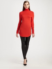 The classic turtleneck gets a luxe update in a slimming silhouette with outstanding goldtone zipper.TurtleneckLong sleevesBack zipperRound hemRayonDry cleanMade in Italy Model shown is 5'10 wearing US size 4. The classic turtleneck gets a luxe update in a slimming silhouette with outstanding goldtone zipper.TurtleneckLong sleevesBack zipperRound hemRayonDry cleanMade in Italy Model shown is 5'10 wearing US size 4.