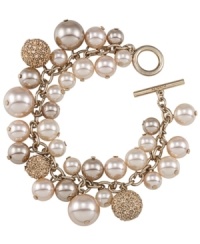 Total elegance. Carolee combine's shimmering glass pearls and crystal fireballs on this chic cluster bracelet. Setting and toggle clasp crafted in 12k gold-plated mixed metal. Approximate length: 8 inches. Total elegance. Carolee combine's shimmering glass pearls and crystal fireballs on this chic cluster bracelet. Setting and toggle clasp crafted in 12k gold-plated mixed metal. Approximate length: 8 inches.