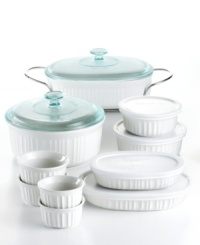 Cook in classic form! This must-have set is made of durable stoneware designed for use virtually anywhere, letting you bake, serve and store in the same dish. The classic, fluted design creates an elegant presentation for any meal, complementing cuisine to delicious perfection. 1-year warranty.