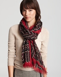 Wrap up in this season's haute plum hue with Burberry's graphic tweed scarf, rendered in a luxurious blend of wool, silk and cashmere. Wrap up in this season's haute plum hue with Burberry's graphic tweed scarf, rendered in a luxurious blend of wool, silk and cashmere.