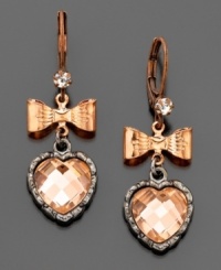 City style with a girly twist. These fabulous Betsy Johnson earrings feature rose goldtone hearts, shining pink crystals and crystal accents. Approximate drop: 1/2 inch. City style with a girly twist. These fabulous Betsy Johnson earrings feature rose goldtone hearts, shining pink crystals and crystal accents. Approximate drop: 1/2 inch.