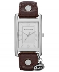 This Taylor collection watch from Michael Kors makes a playful nod to retro luggage design. This Taylor collection watch from Michael Kors makes a playful nod to retro luggage design.
