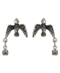 Free-flying style by Betsey Johnson. These silvertone mixed metal earrings feature crystal accents. Approximate drop: 1 inch. Free-flying style by Betsey Johnson. These silvertone mixed metal earrings feature crystal accents. Approximate drop: 1 inch.