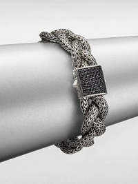From the Classic Chain Collection. This nature-inspired style from a socially and environmentally responsible brand features intricately designed sterling silver chains in a braided style accented with a black sapphire encrusted closure. Sterling silverBlack sapphireLength, about 7.25Push clasp closureImported From the Classic Chain Collection. This nature-inspired style from a socially and environmentally responsible brand features intricately designed sterling silver chains in a braided style accented with a black sapphire encrusted closure. Sterling silverBlack sapphireLength, about 7.25Push clasp closureImported