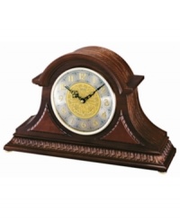 This handsome clock from Seiko offers timeless charm, while keeping you on time. Solid oak case with hand-rubbed finish. Crystal-encased round metal dial features brass bezel, engraved vine pattern on silvertone metal, applied numeral indices, Westminster/Whittington quarter-hour chime, hourly strikes, volume control with nighttime chime silencer and logo. Battery included. Measures approximately 10-1/2 x 16-1/2 x 5. This handsome clock from Seiko offers timeless charm, while keeping you on time. Solid oak case with hand-rubbed finish. Crystal-encased round metal dial features brass bezel, engraved vine pattern on silvertone metal, applied numeral indices, Westminster/Whittington quarter-hour chime, hourly strikes, volume control with nighttime chime silencer and logo. Battery included. Measures approximately 10-1/2 x 16-1/2 x 5.