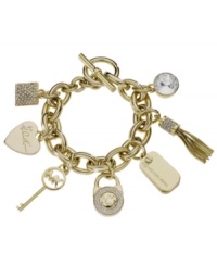 Bring on the charm. Make the perfect first impression with this designer style from Michael Kors. Crafted in gold tone mixed metal, bracelet features a variety of signature charms and Czech crystals with a trendy toggle clasp. Approximate length: 8 inches. Approximate charm drops: 1/2 inch to 1 inch. Bring on the charm. Make the perfect first impression with this designer style from Michael Kors. Crafted in gold tone mixed metal, bracelet features a variety of signature charms and Czech crystals with a trendy toggle clasp. Approximate length: 8 inches. Approximate charm drops: 1/2 inch to 1 inch.