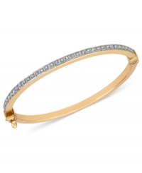A beautiful statement. This bangle bracelet is crafted from 14k gold with diamond accents adding to the sparkle. Approximate diameter: 1-5/8 inches x 1-3/8 inches. A beautiful statement. This bangle bracelet is crafted from 14k gold with diamond accents adding to the sparkle. Approximate diameter: 1-5/8 inches x 1-3/8 inches.