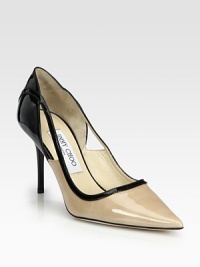 Two-tone point toe design in polished patent leather, with side cutouts for a sexy hint of skin. Lacquered heel, 3½ (90mm)Patent leather upperPoint toeLeather lining and solePadded insoleMade in Italy Two-tone point toe design in polished patent leather, with side cutouts for a sexy hint of skin. Lacquered heel, 3½ (90mm)Patent leather upperPoint toeLeather lining and solePadded insoleMade in Italy