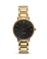 Take an citified approach to accessorizing with this gold-plated watch from kate spade new york. It's round design is city chic, while the Mother-of-Pearl face is oh so urbane. Take an citified approach to accessorizing with this gold-plated watch from kate spade new york. It's round design is city chic, while the Mother-of-Pearl face is oh so urbane.